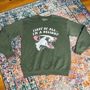 Lucy Jaynes First of All… I’m a Delight Rat Possum Green Graphic Sweater